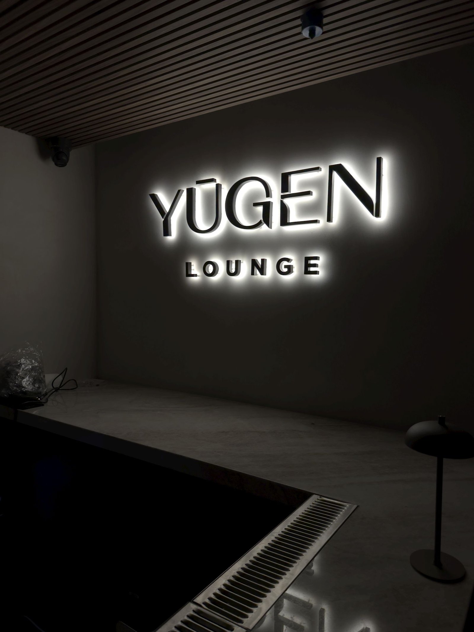 White illuminated letters for Yugen Lounge